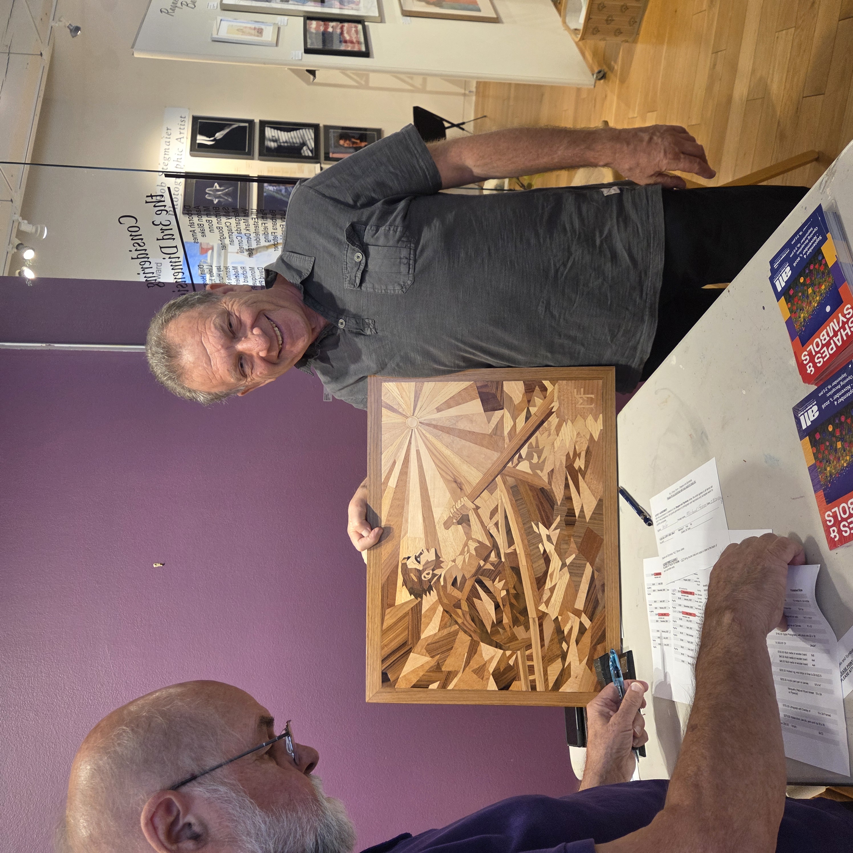 Michael Farro delivering Still Rowing for the Arts League of Lowell Shapes and Symbols exhibition